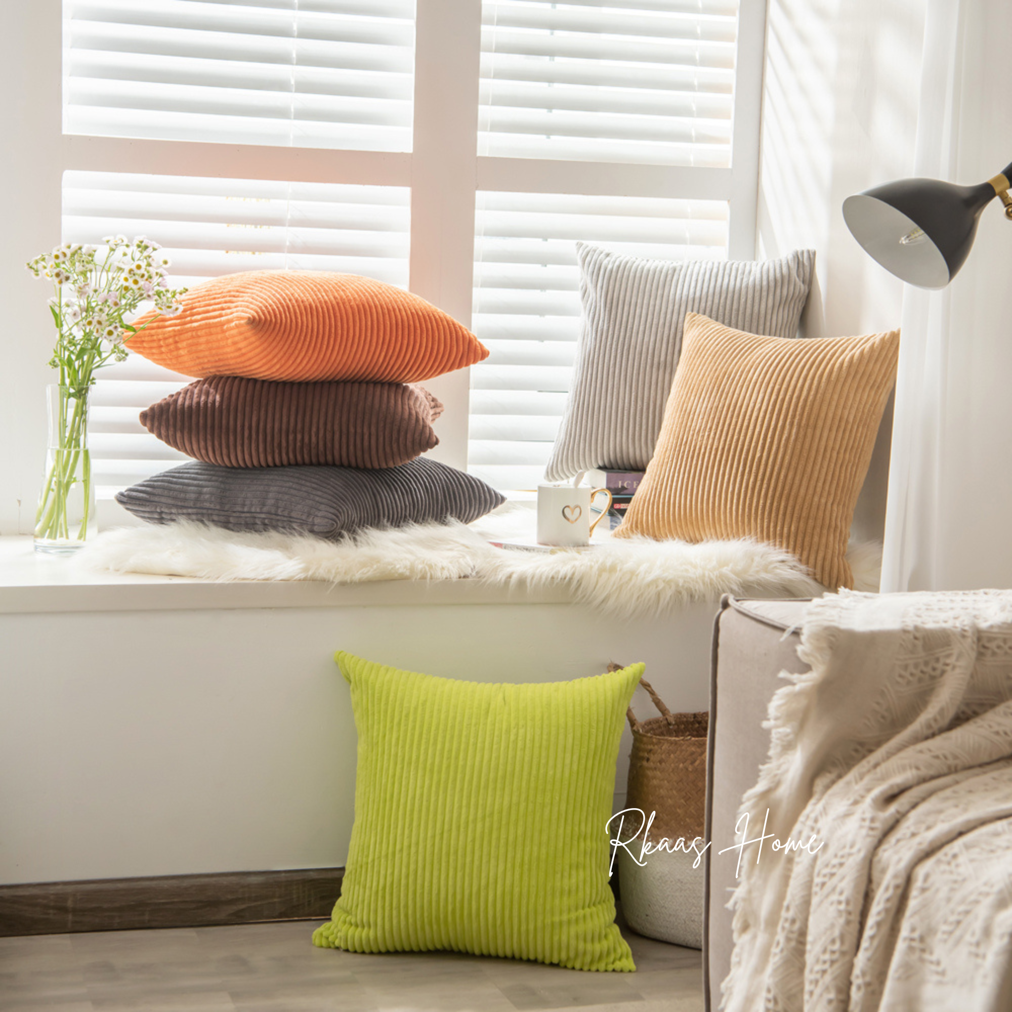 A set of colorful corduroy cushion covers in various sizes, showcasing a striped pattern, perfect for home decor.