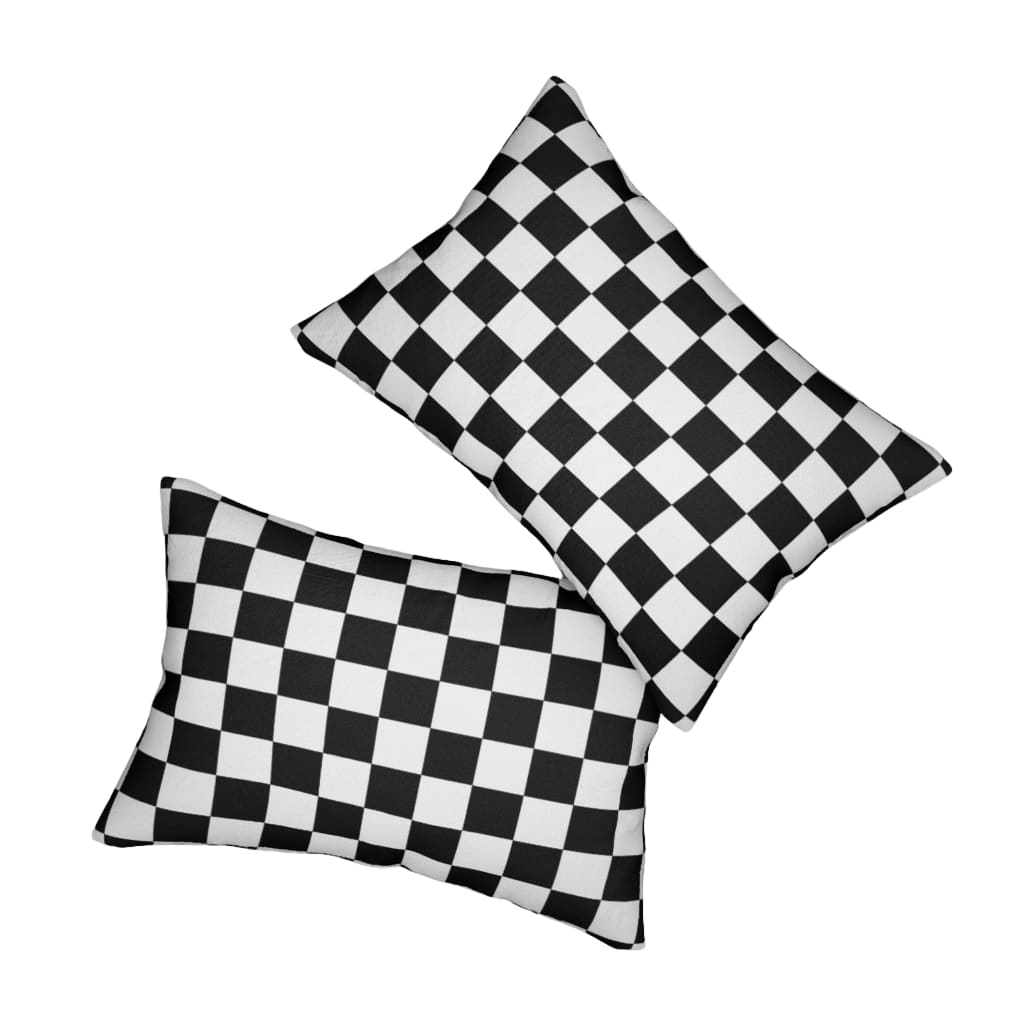 Decorative lumbar throw pillow featuring a black and white checkered pattern, made from spun-polyester with a concealed zipper.