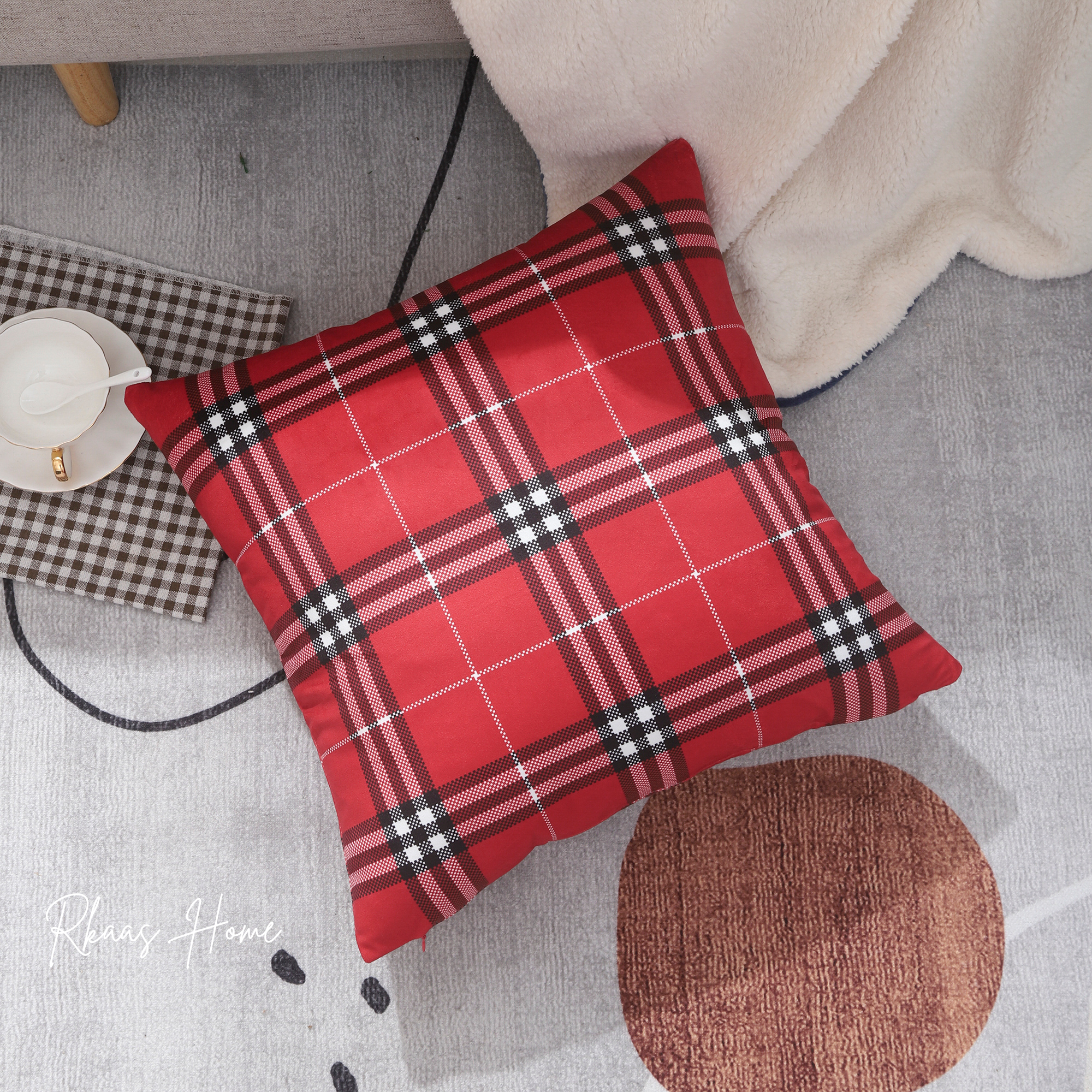A luxurious red velvet cushion cover featuring a classic tartan check pattern, measuring 45cm x 45cm, perfect for home or hotel decor.