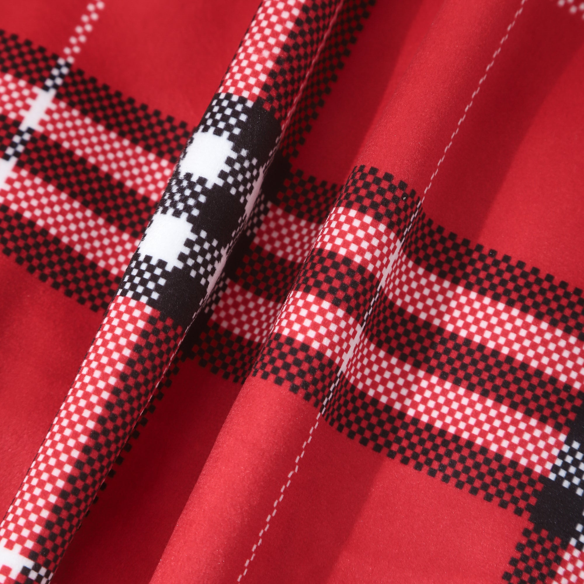 A luxurious red velvet cushion cover featuring a classic tartan check pattern, measuring 45cm x 45cm, perfect for home or hotel decor.