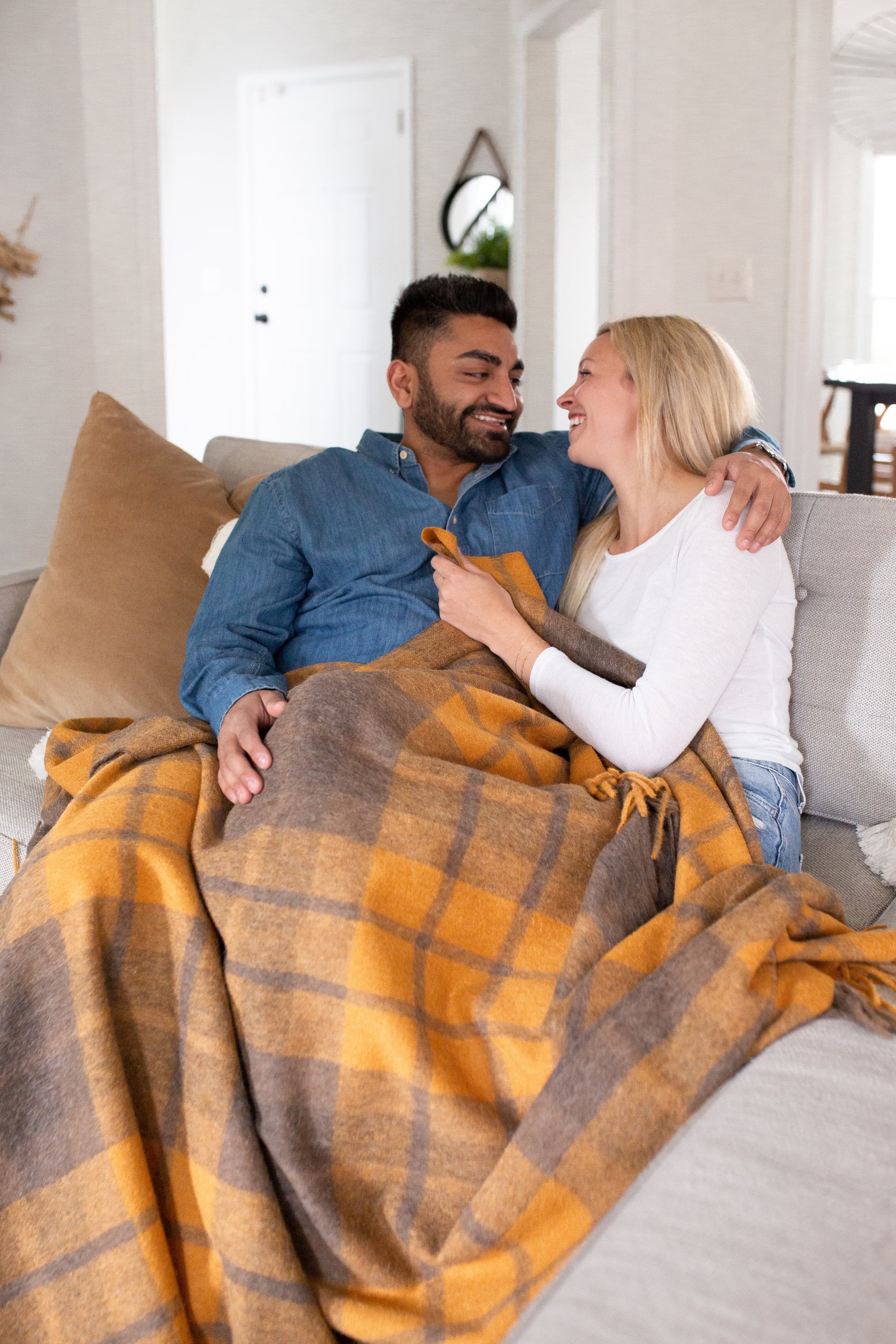 Estancia Alpaca Blend Throw in Grey and Mustard Yellow, showcasing its soft texture and elegant design.