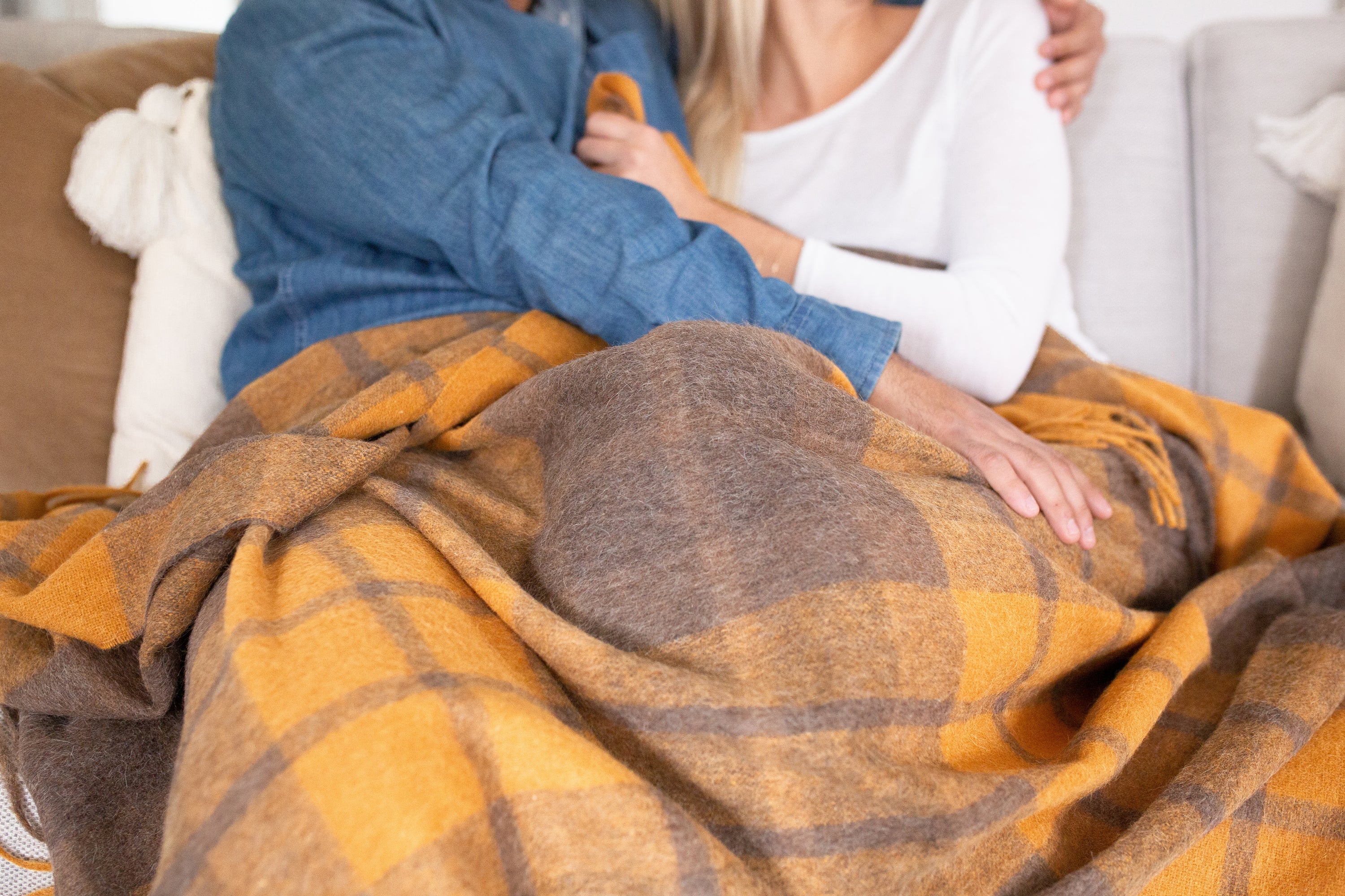 Estancia Alpaca Blend Throw in Grey and Mustard Yellow, showcasing its soft texture and elegant design.