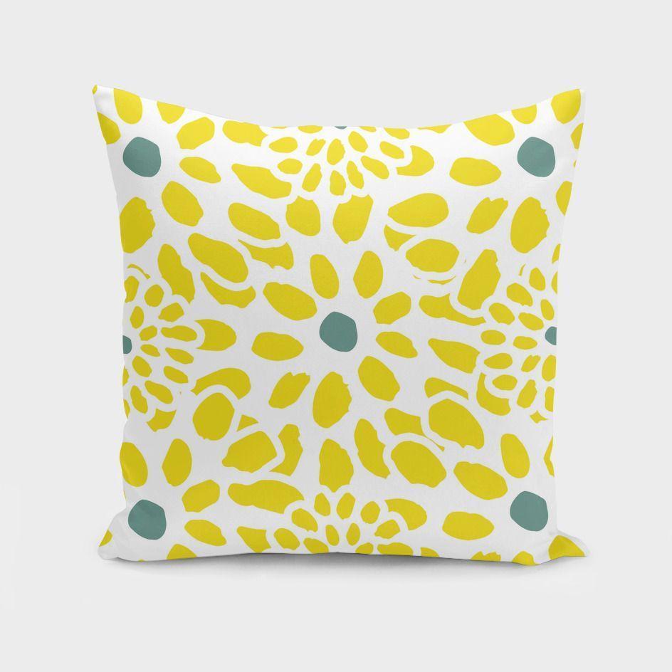 A vibrant yellow cushion featuring a floral design, perfect for home decor, showcasing its double-sided print and concealed zipper.