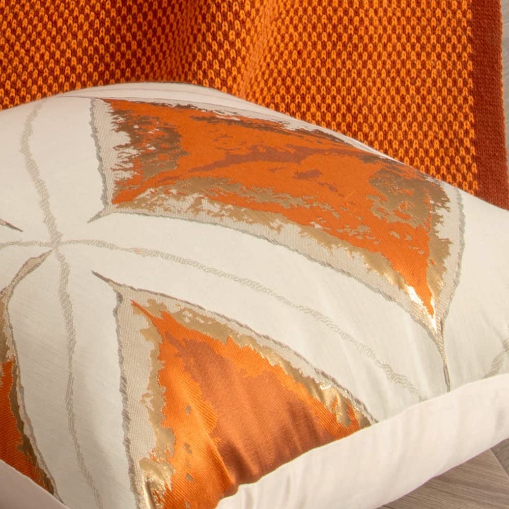 Geometric pattern cushion cover in orange and green, 45cm x 45cm, showcasing modern design and vibrant colors.