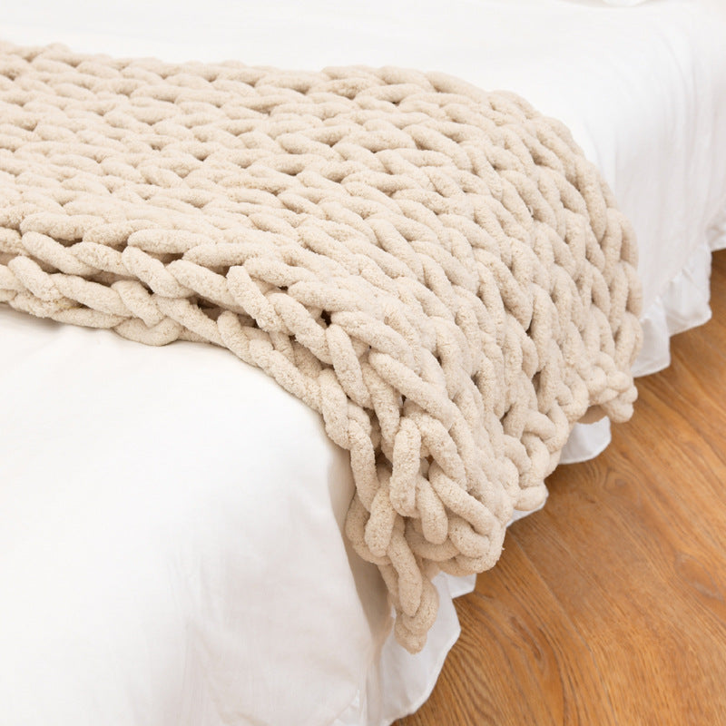 Handmade coarse yarn knitted chenille rod blanket in various colors, showcasing its soft texture and cozy design.