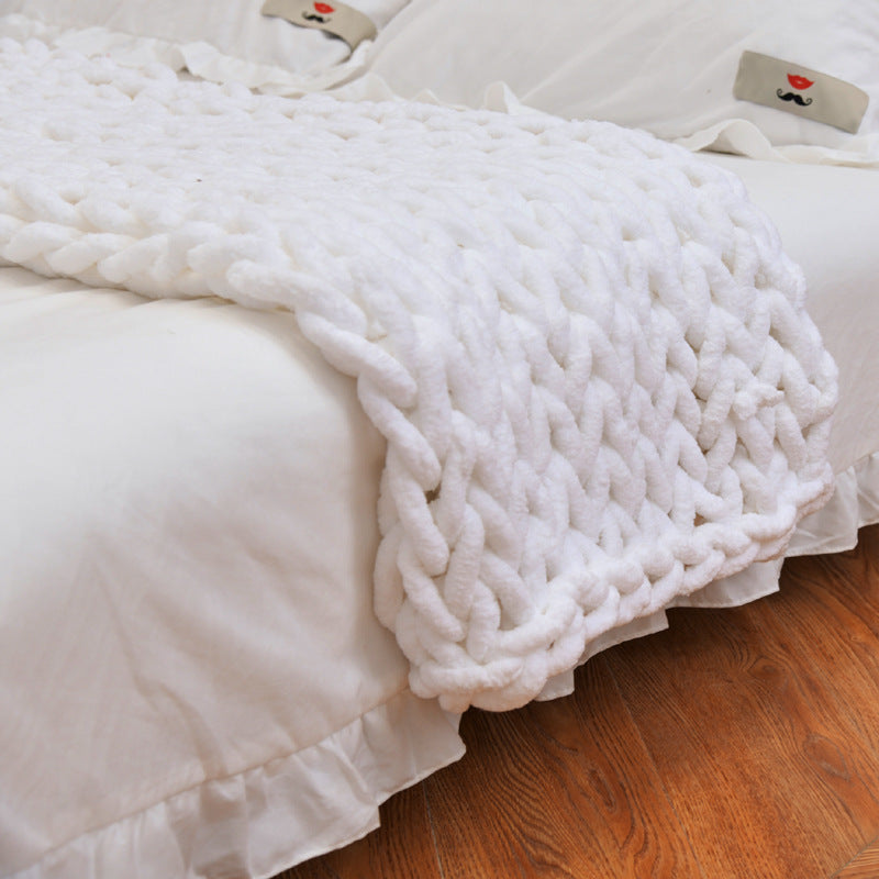 Handmade coarse yarn knitted chenille rod blanket in various colors, showcasing its soft texture and cozy design.