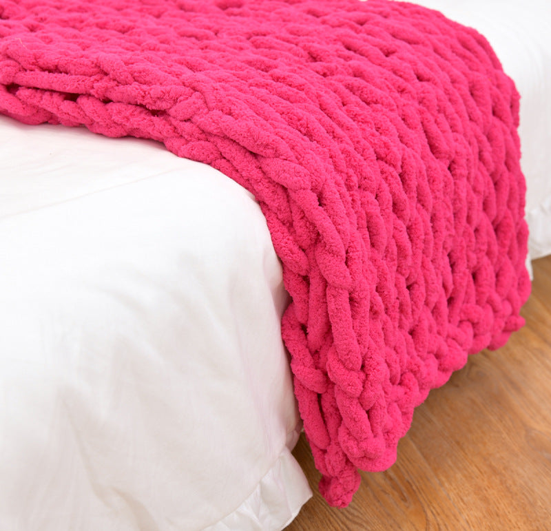 Handmade coarse yarn knitted chenille rod blanket in various colors, showcasing its soft texture and cozy design.