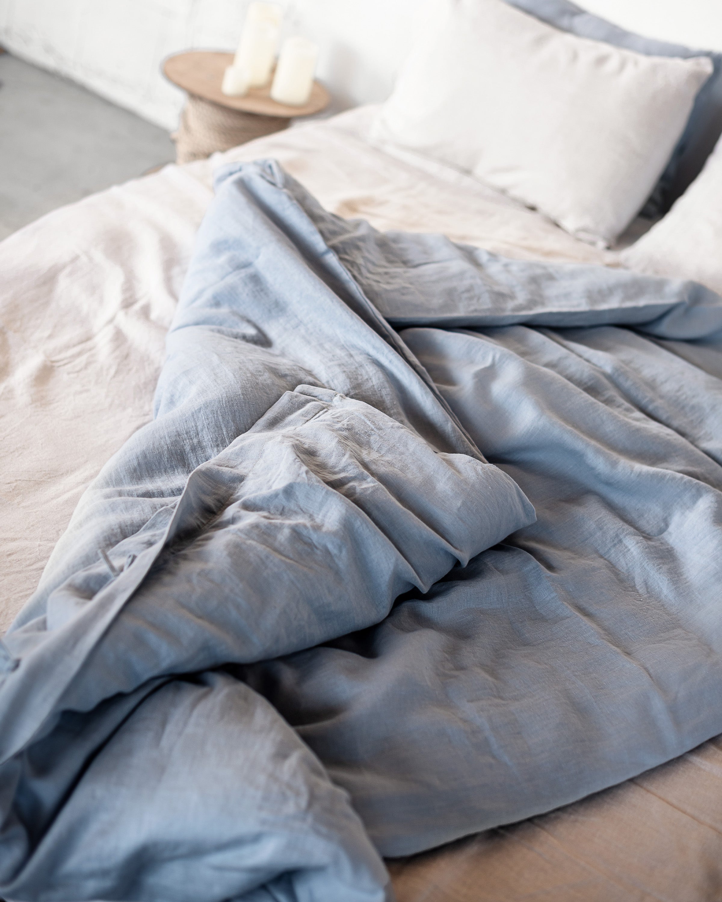 Ice Blue linen bedding set featuring a duvet cover with zipper closure, bedsheet, and pillowcases, showcasing a minimalist Scandinavian design.