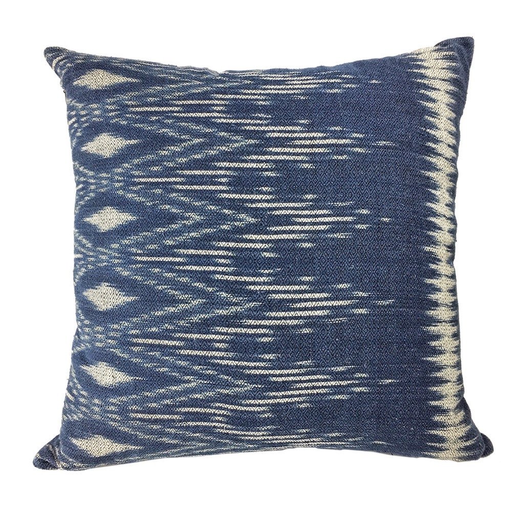 Handcrafted Indigo Ikat Pillow Cover made from natural indigo dyed cotton, showcasing unique artisan craftsmanship.
