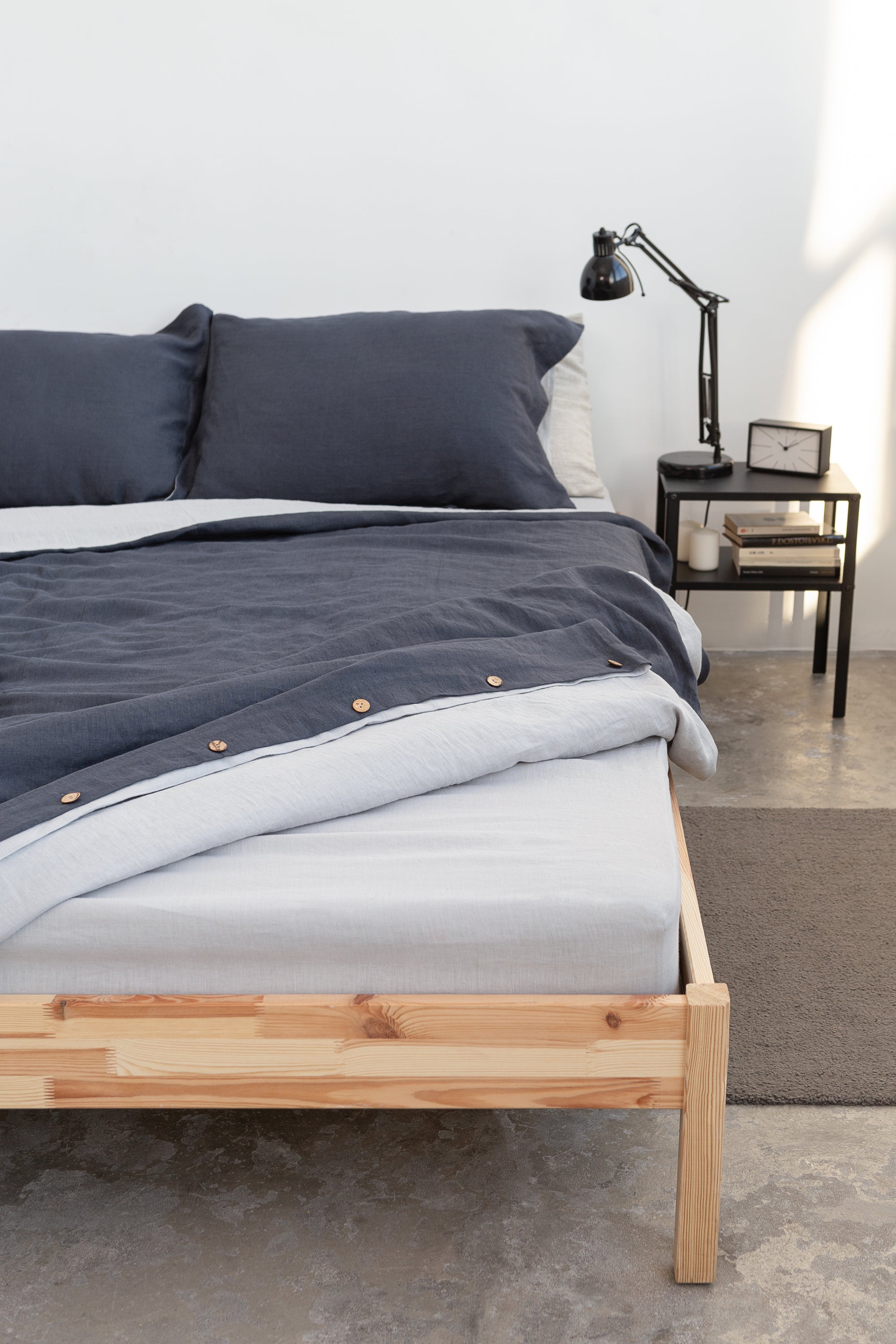 Natural Light linen fitted bed sheet showcasing its soft texture and elegant design, perfect for enhancing bedroom decor.