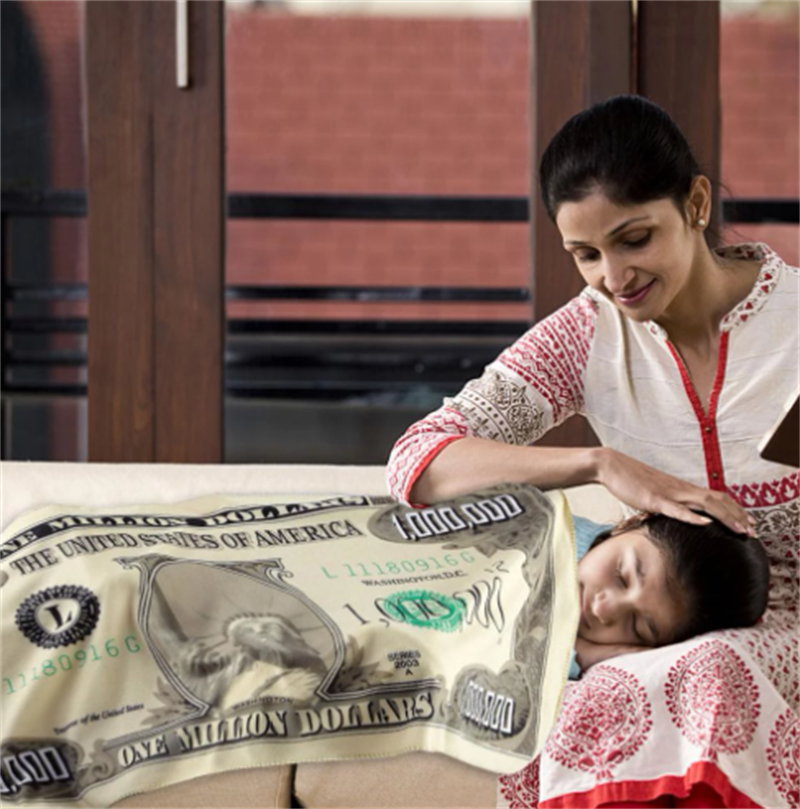 A plush Million-dollar Novelty Blanket made of high-quality flannel, featuring realistic prints and a cozy design, perfect for lounging or travel.
