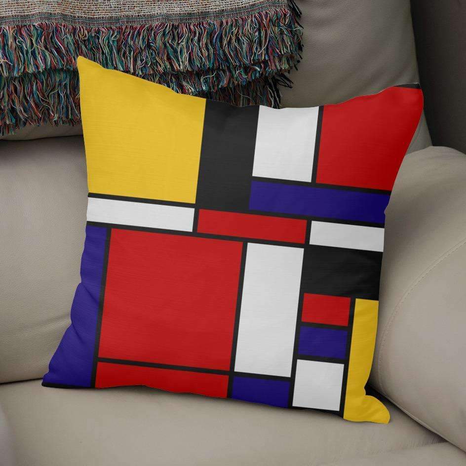 A stylish Mondrian De Stijl Art Movement Pillow featuring geometric patterns and vibrant colors, designed by Saadana Shanmukam, with a concealed zipper.