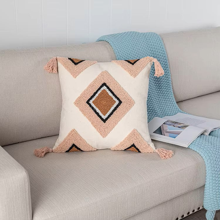 A stylish Moroccan Cushion Cover in pink tufted design, showcasing its elegant texture and quality materials.