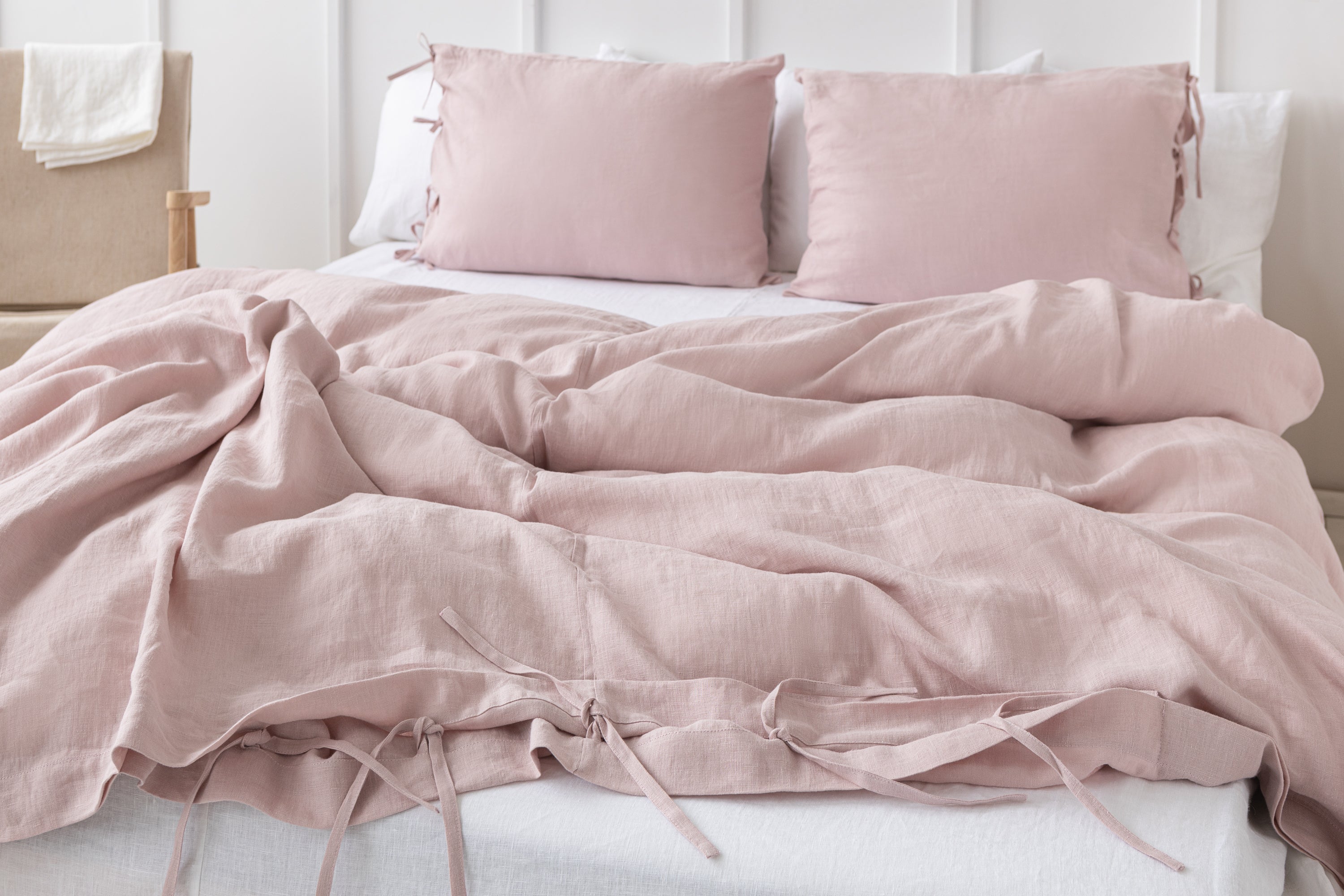 Pale Pink linen duvet cover with ties, showcasing its soft texture and elegant color, perfect for enhancing bedroom decor.