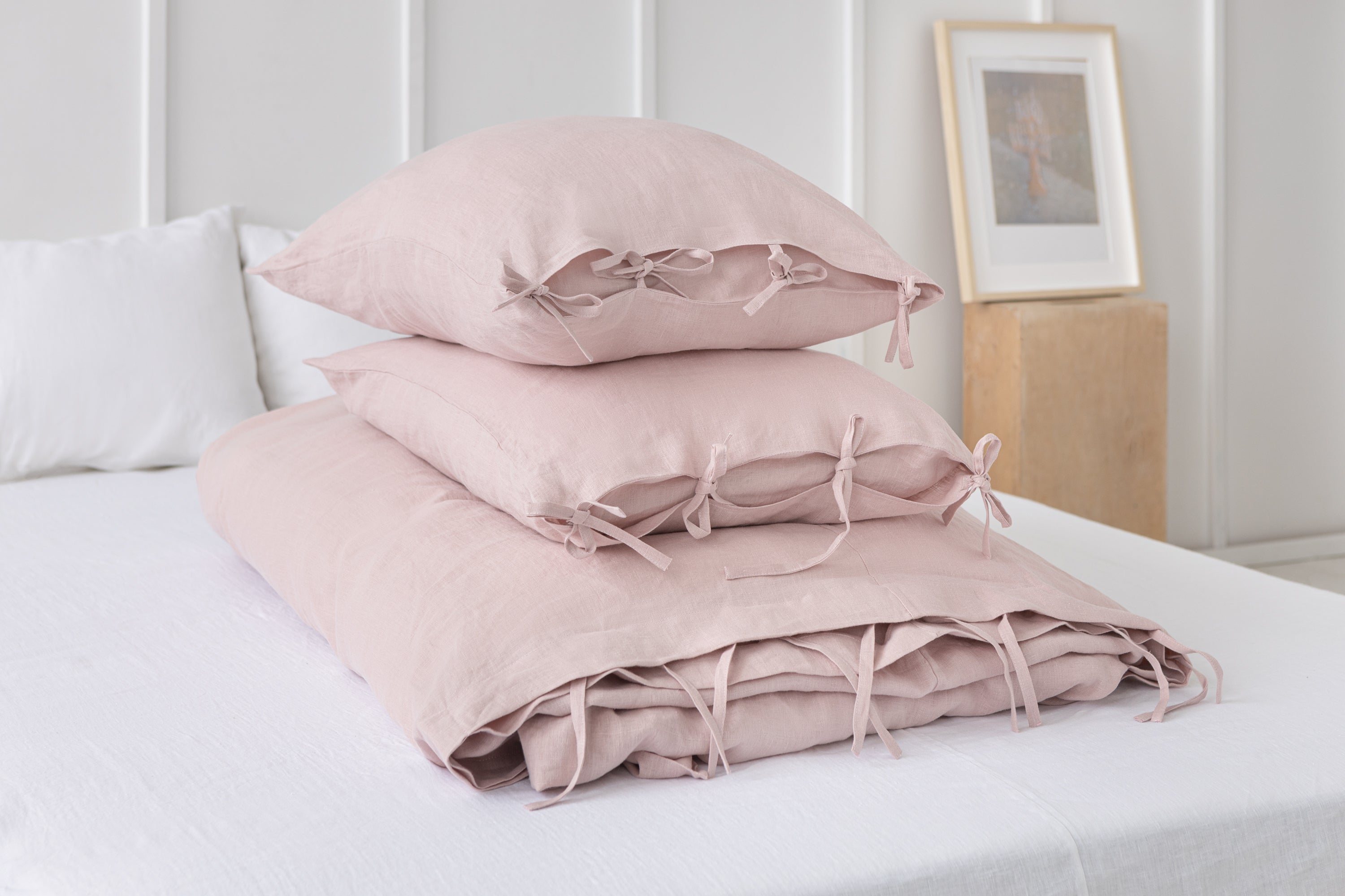 Pale Pink linen duvet cover with ties, showcasing its soft texture and elegant color, perfect for enhancing bedroom decor.