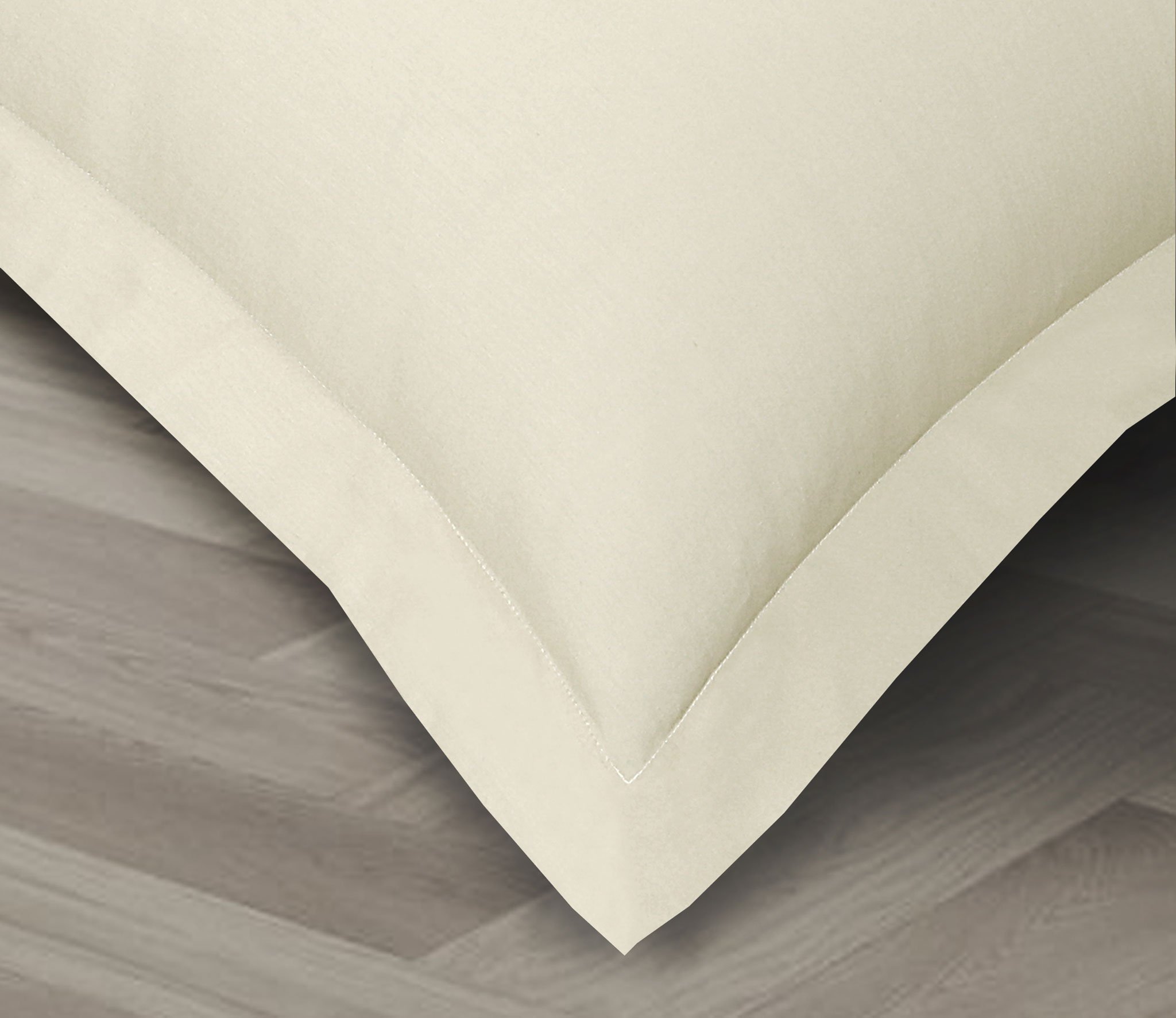 A set of two crisp, lightweight Percale pillowcases made from 100% cotton, showcasing their smooth texture and elegant design.