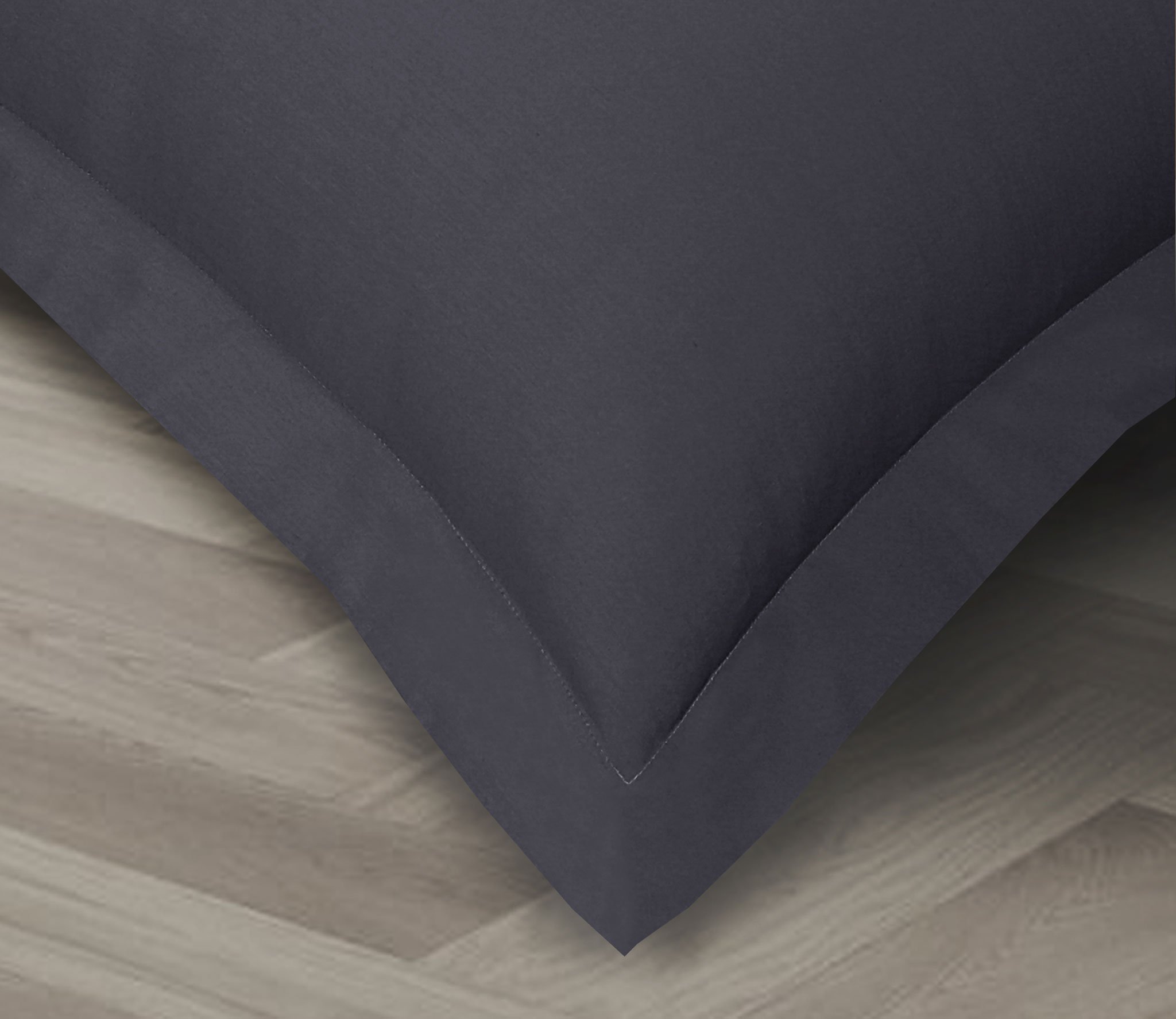 A set of two crisp, lightweight Percale pillowcases made from 100% cotton, showcasing their smooth texture and elegant design.