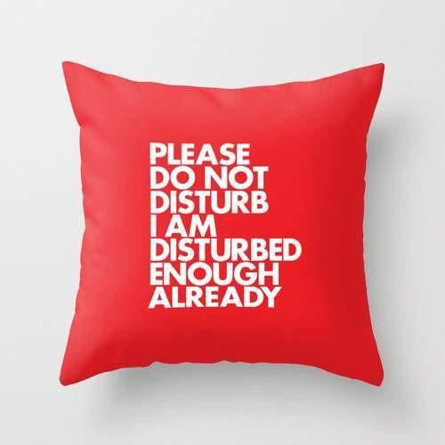 A stylish throw pillow cover featuring the phrase 'Please Do Not Disturb I Am Disturbed Enough Already' in a vibrant design, made from durable polyester fabric.