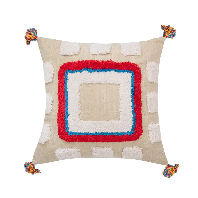 Handmade tassel tufted knitted cushion cover in geometric art design, featuring soft cotton and linen material with a zipper closure.