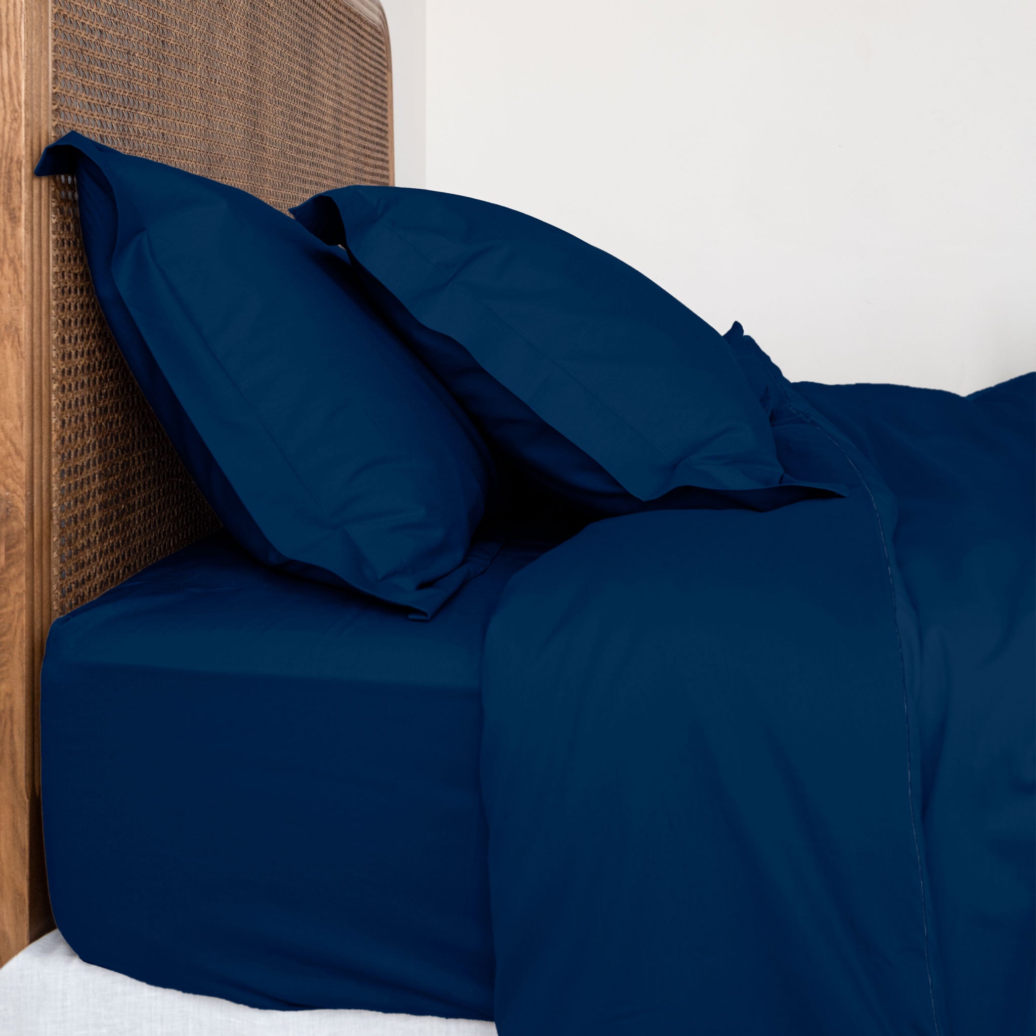 Twill Duvet Cover set in dark colours featuring a soft, luxurious texture with matching pillowcases, perfect for enhancing bedroom decor.