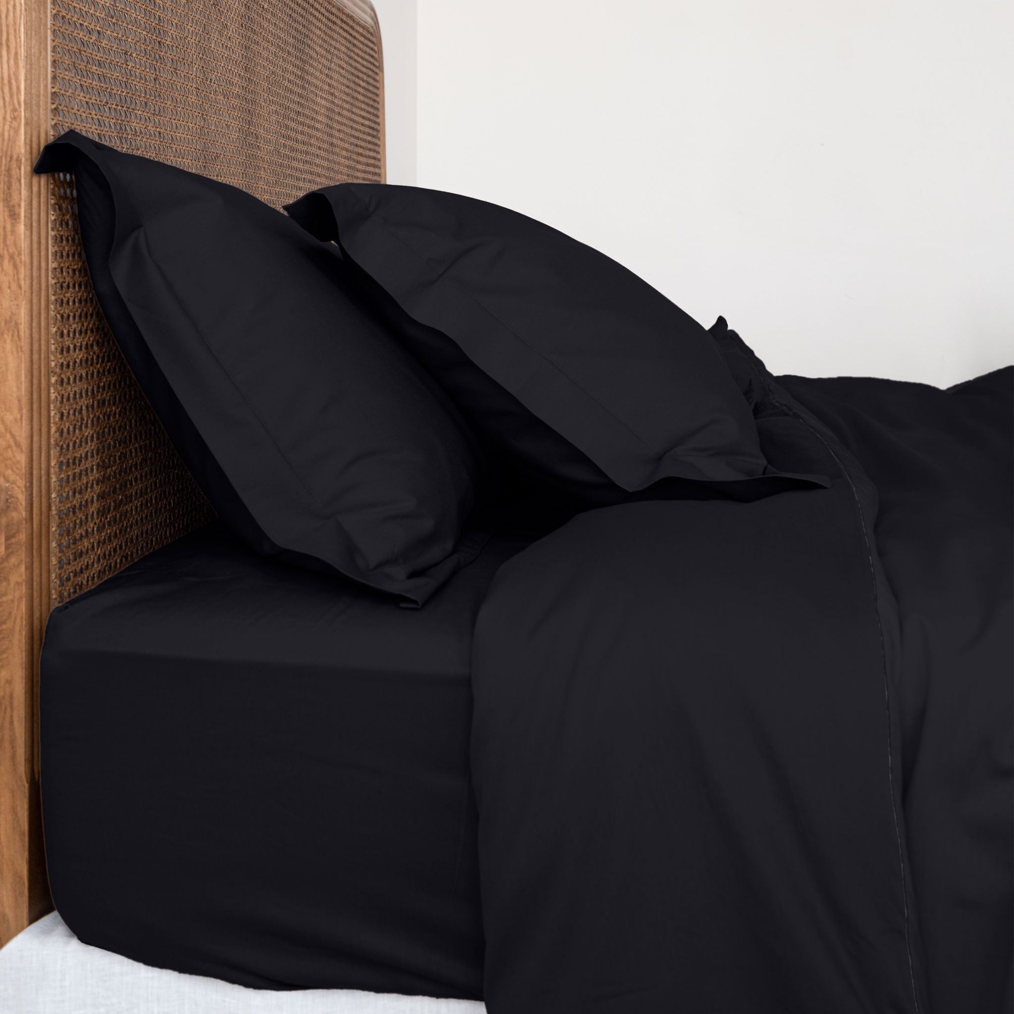 Twill Duvet Cover set in dark colours featuring a soft, luxurious texture with matching pillowcases, perfect for enhancing bedroom decor.