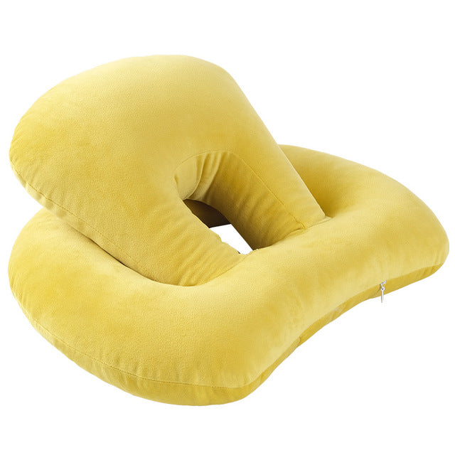 U-Shaped Desk Nap Pillow in various colors, designed for neck support and comfort during travel or desk use.
