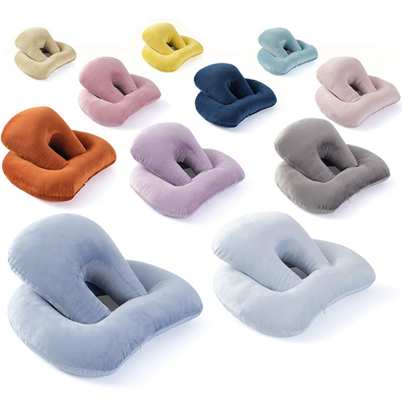 U-Shaped Desk Nap Pillow in various colors, designed for neck support and comfort during travel or desk use.