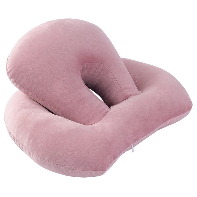 U-Shaped Desk Nap Pillow in various colors, designed for neck support and comfort during travel or desk use.