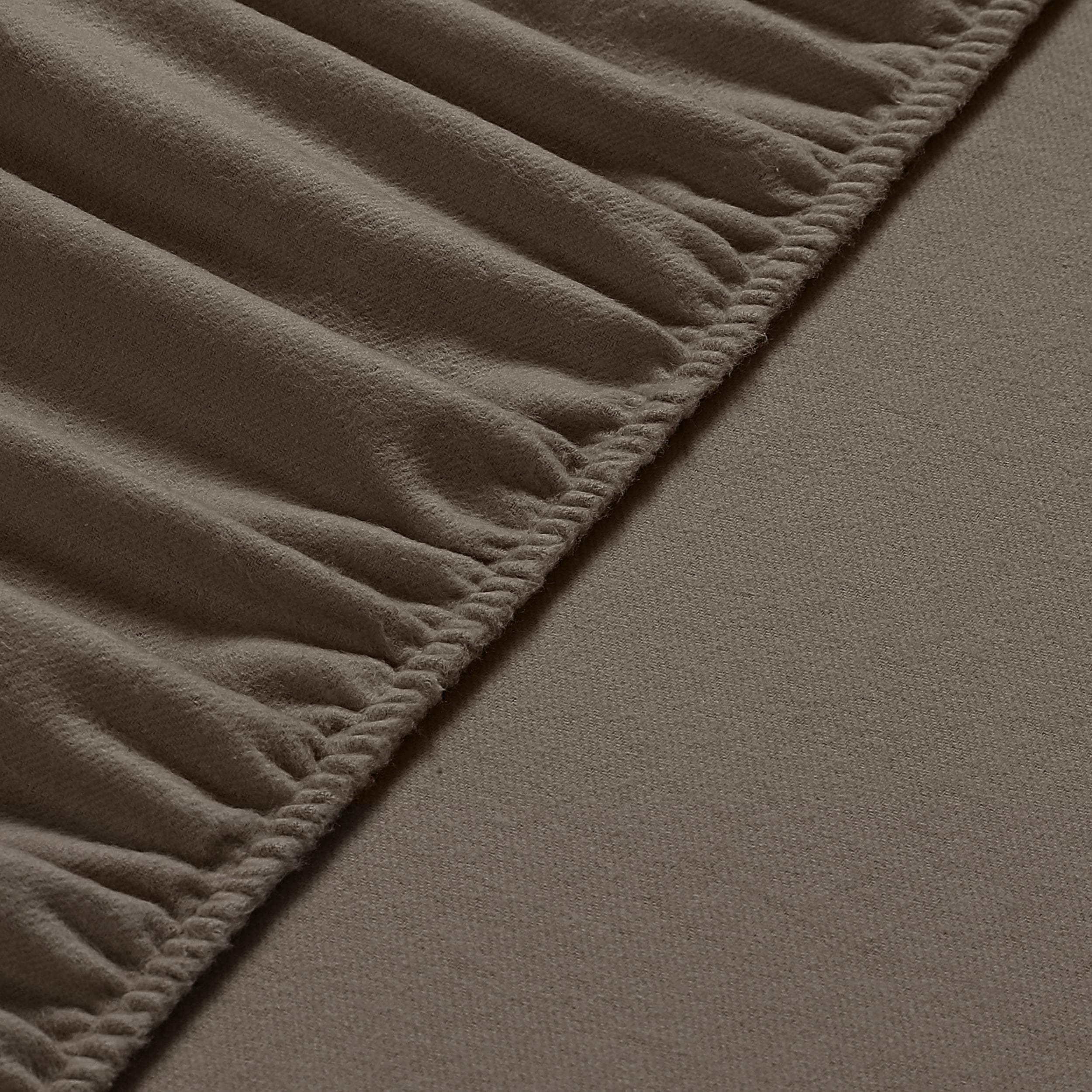 A plush Velvet Flannel Fitted Sheet in a cozy bedroom setting, showcasing its soft texture and elegant design.