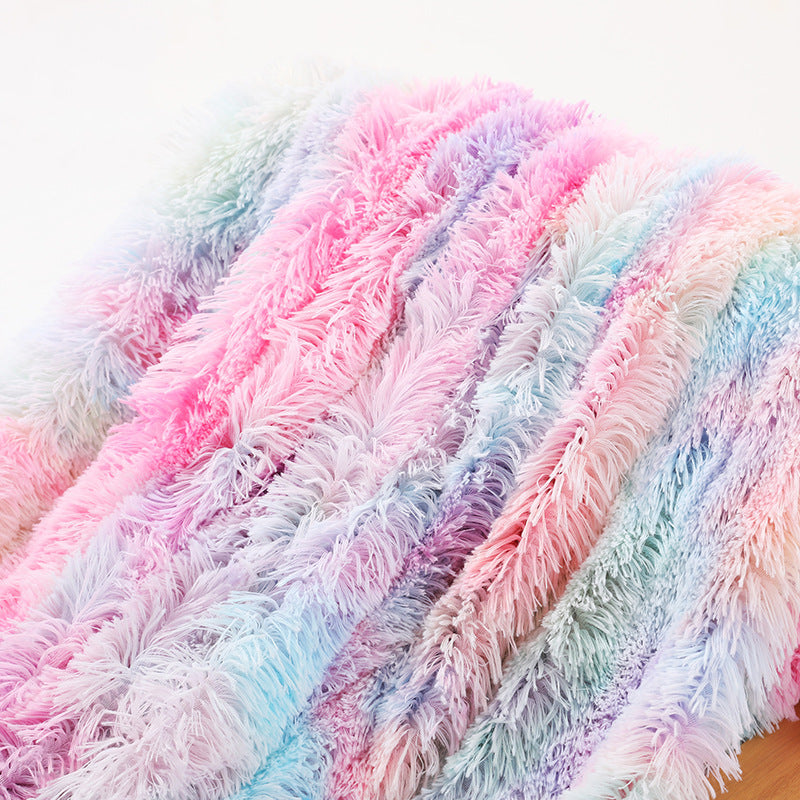 Warm Fluffy Shaggy Throw Blanket in various colors, showcasing its soft faux fur texture and elegant design.