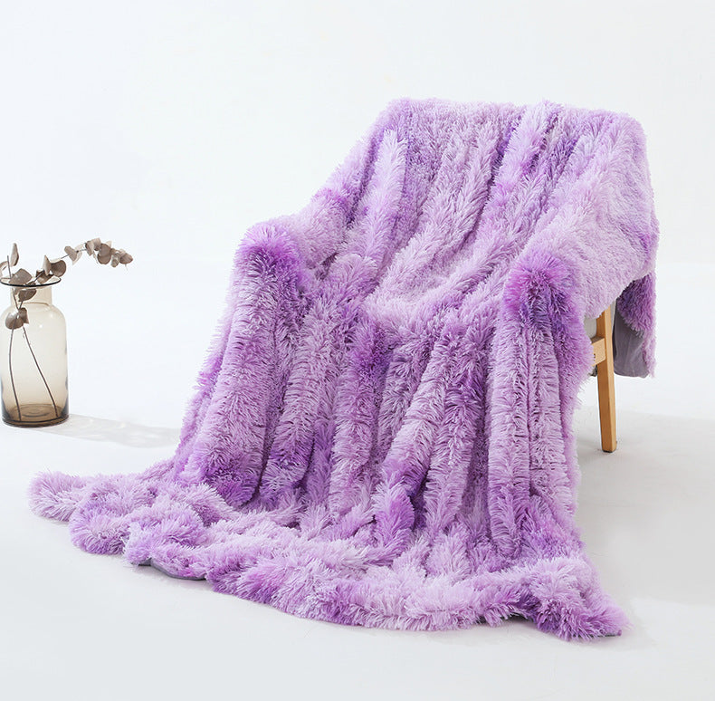 Warm Fluffy Shaggy Throw Blanket in various colors, showcasing its soft faux fur texture and elegant design.