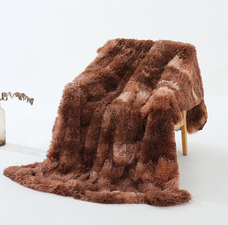 Warm Fluffy Shaggy Throw Blanket in various colors, showcasing its soft faux fur texture and elegant design.