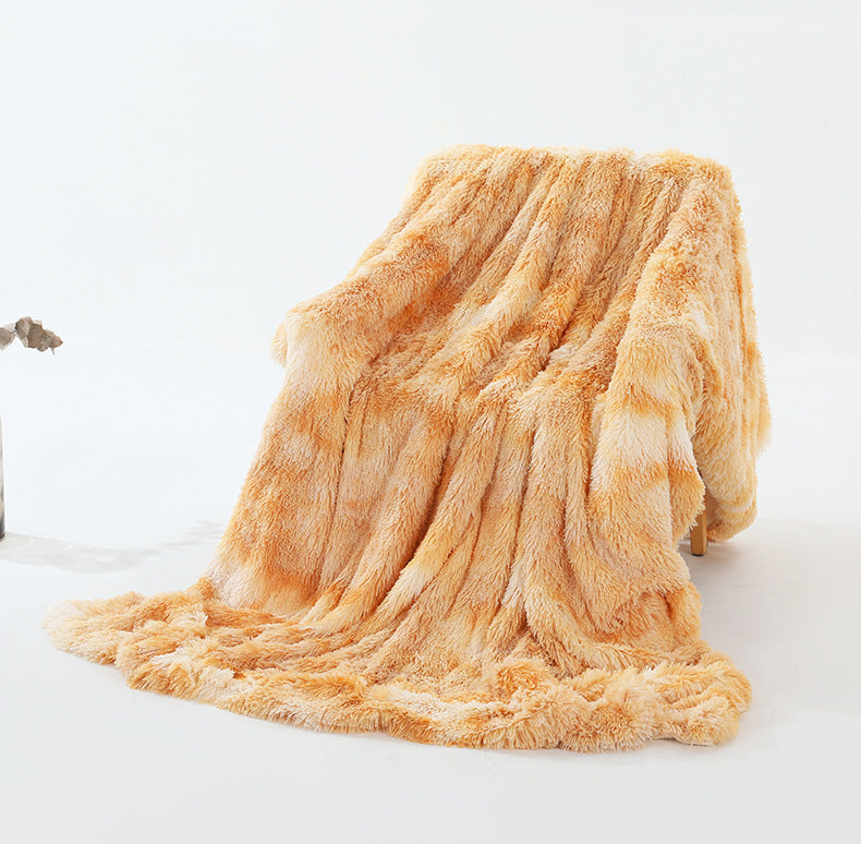 Warm Fluffy Shaggy Throw Blanket in various colors, showcasing its soft faux fur texture and elegant design.