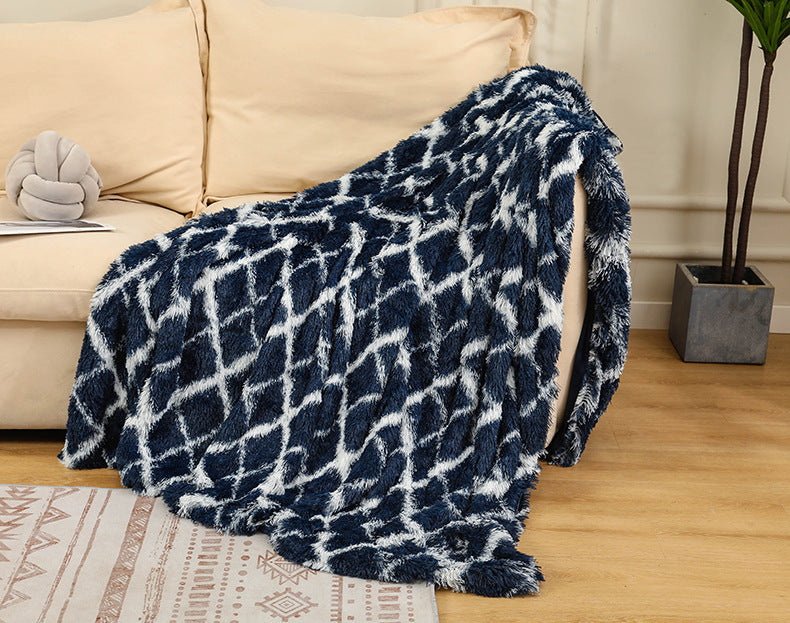 Warm Fluffy Shaggy Throw Blanket in various colors, showcasing its soft faux fur texture and elegant design.