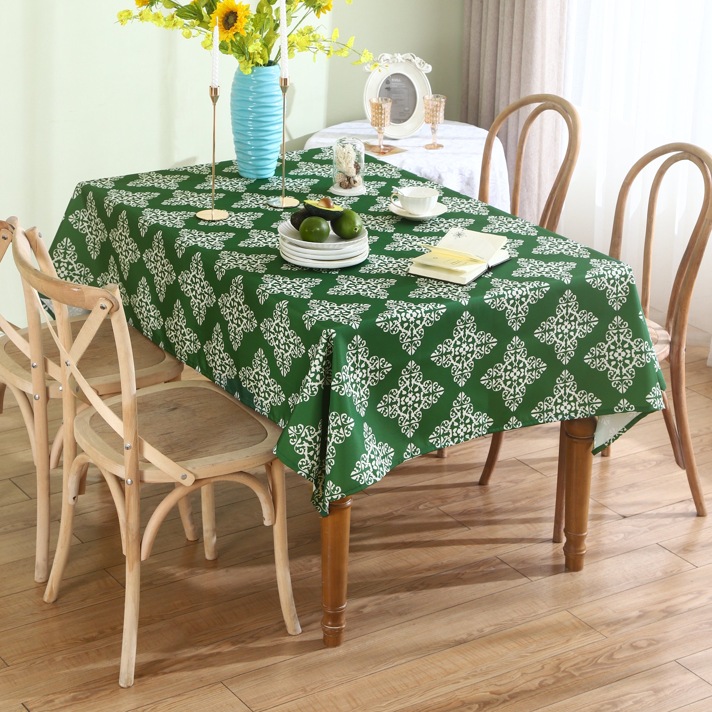 Water resistant green table cloth with geometric pattern, suitable for indoor and outdoor use.