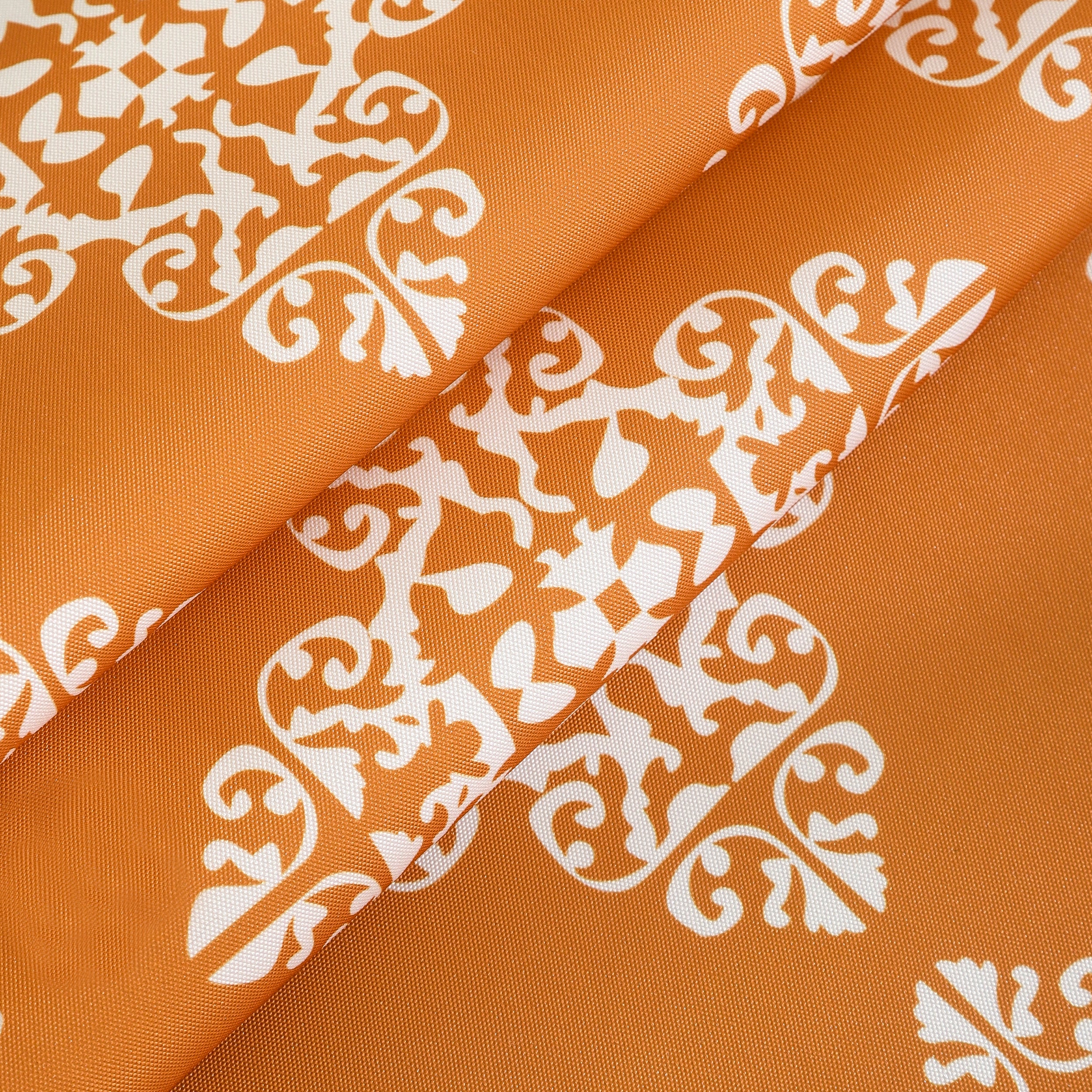 Orange water-resistant table cloth with geometric pattern, suitable for indoor and outdoor use.