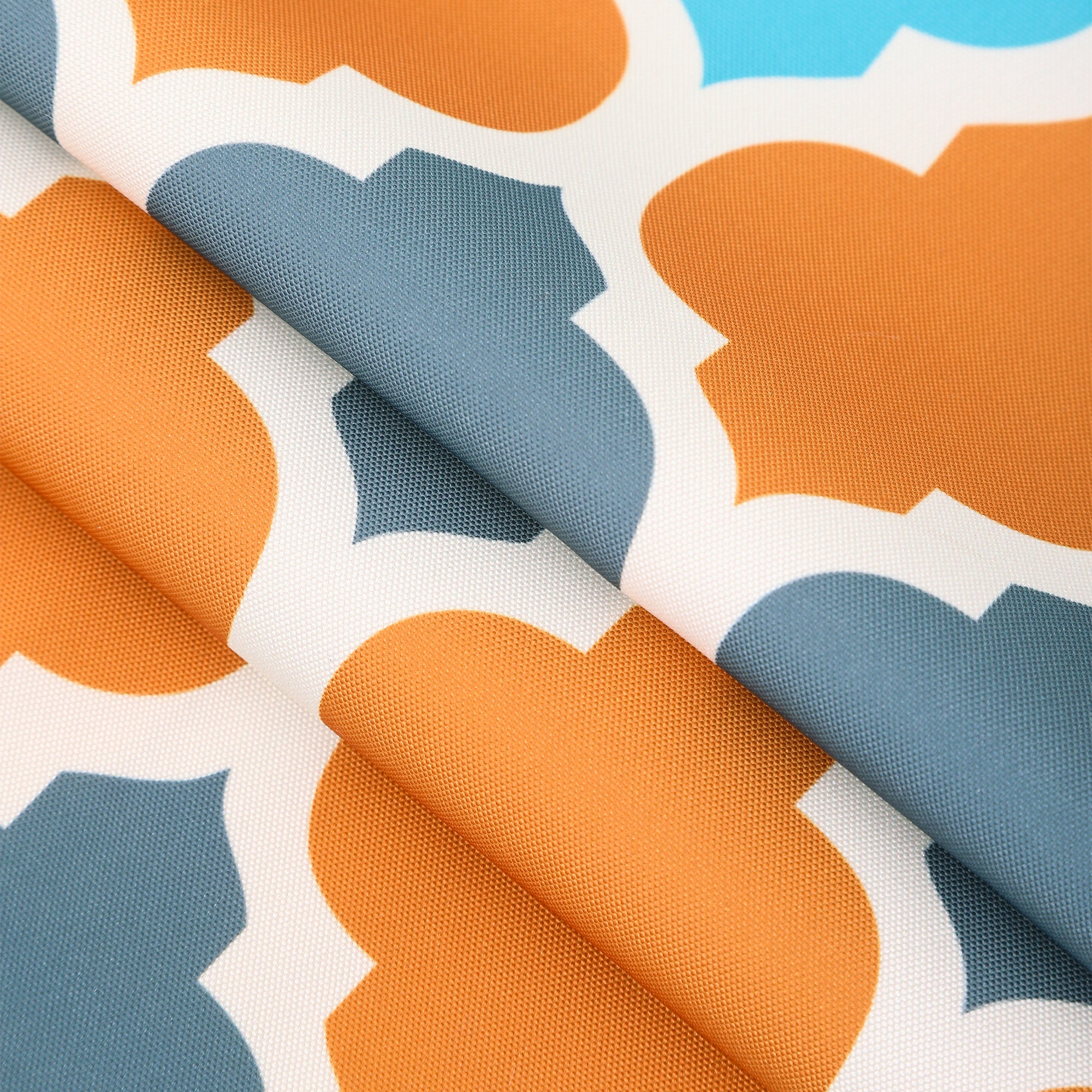 Water resistant indoor outdoor table cloth in vibrant orange with geometric pattern, measuring 137x185 CM, suitable for various occasions.