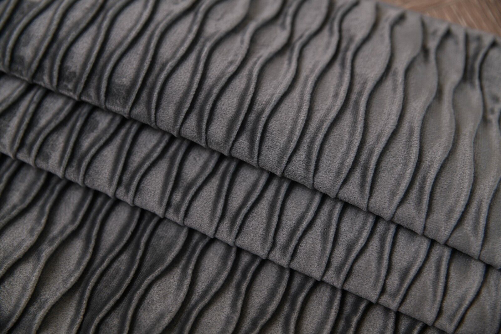 Wave pattern velvet cushion covers in various sizes, showcasing a luxurious texture and elegant design.