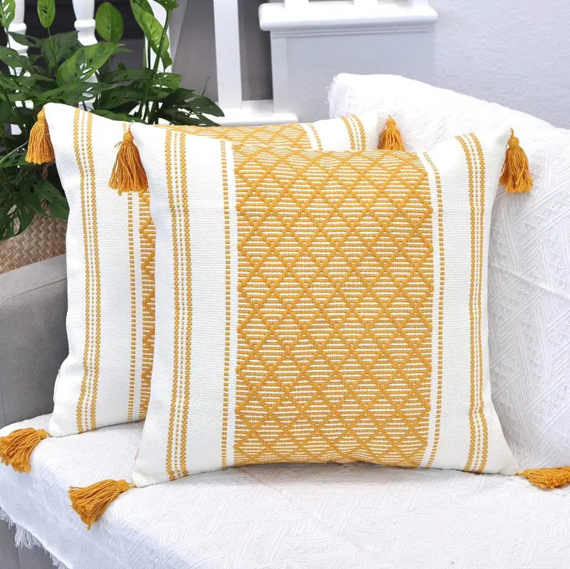 Woven Jacquard Tassel Cushion Cover featuring geometric patterns and delicate tassels, perfect for home decor.