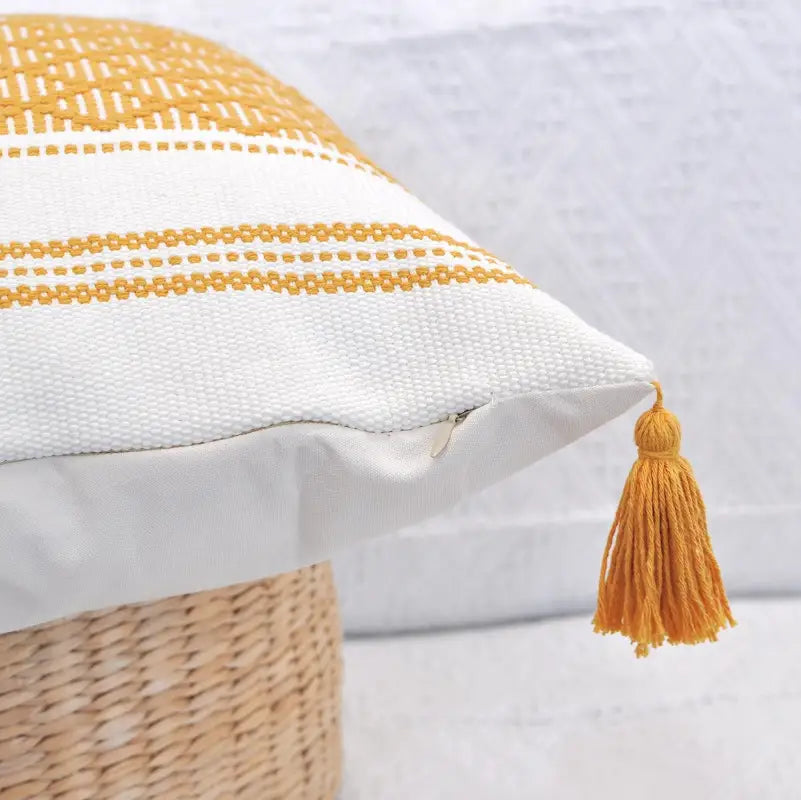 Woven Jacquard Tassel Cushion Cover featuring geometric patterns and delicate tassels, perfect for home decor.