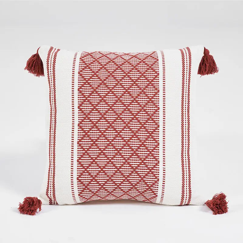 Woven Jacquard Tassel Cushion Cover featuring geometric patterns and delicate tassels, perfect for home decor.