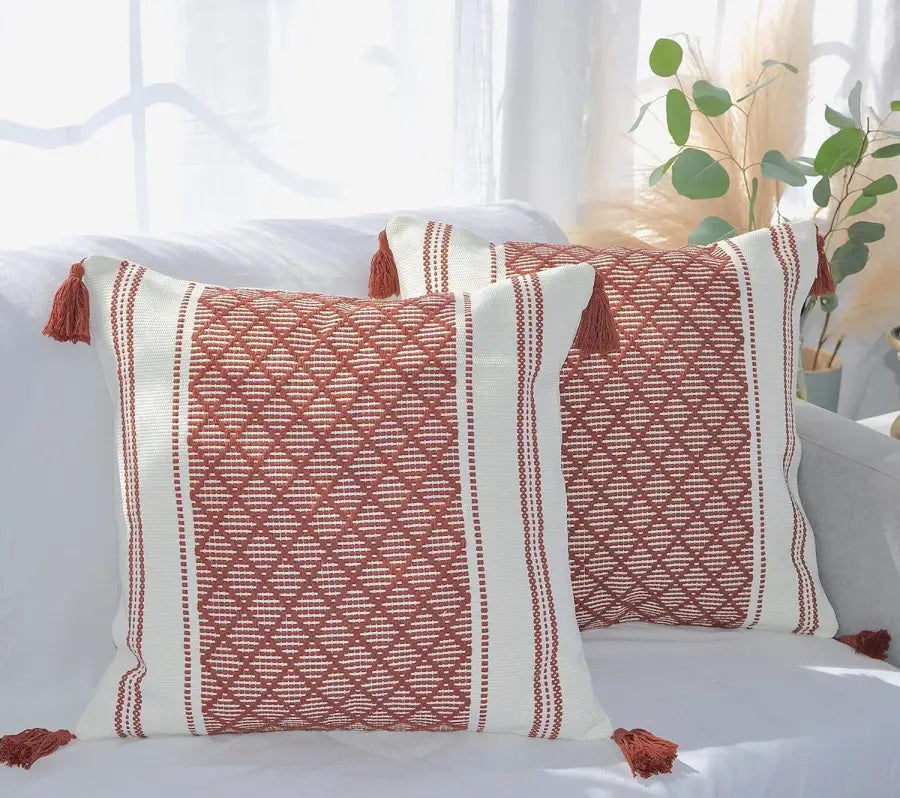 Woven Jacquard Tassel Cushion Cover featuring geometric patterns and delicate tassels, perfect for home decor.