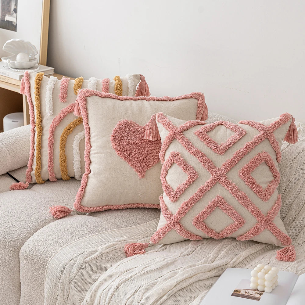 Woven Tufted Decorative Pillow Cover in pink boho design with tassels, showcasing a stylish and comfortable linen cotton blend.