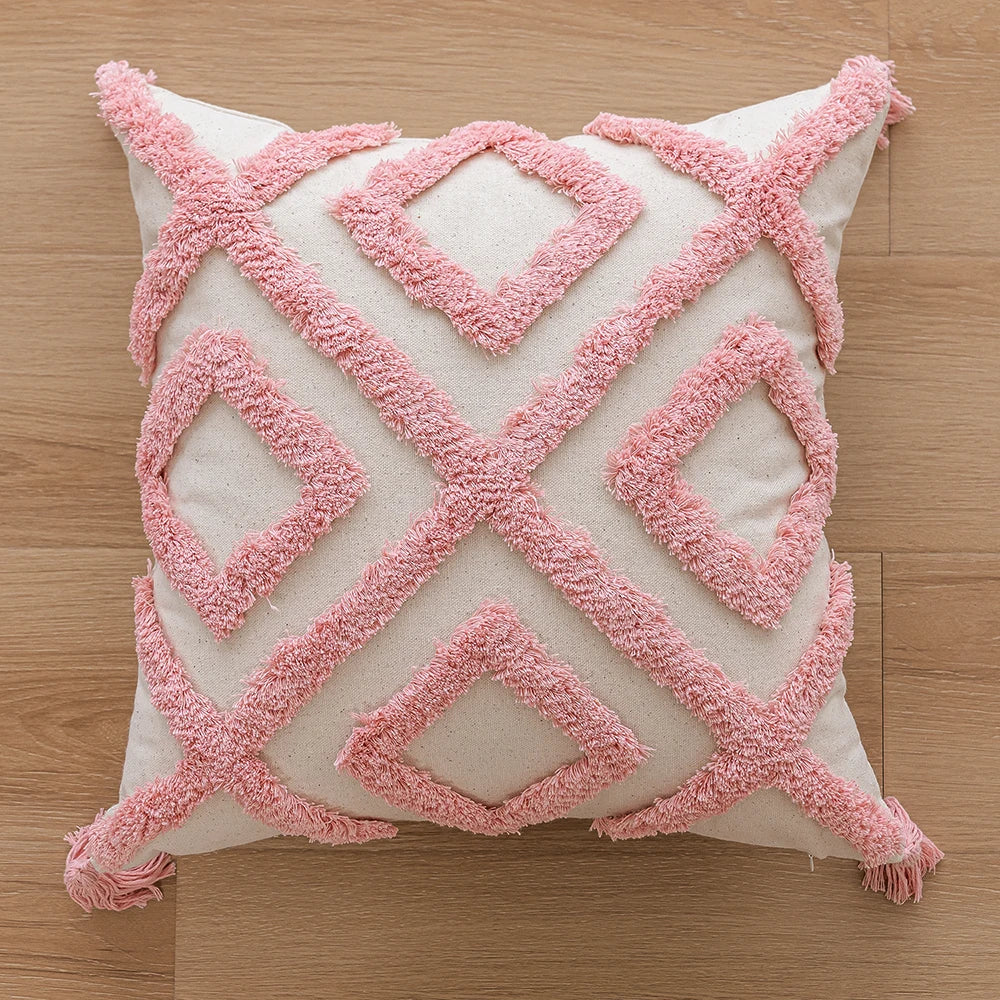 Woven Tufted Decorative Pillow Cover in pink boho design with tassels, showcasing a stylish and comfortable linen cotton blend.