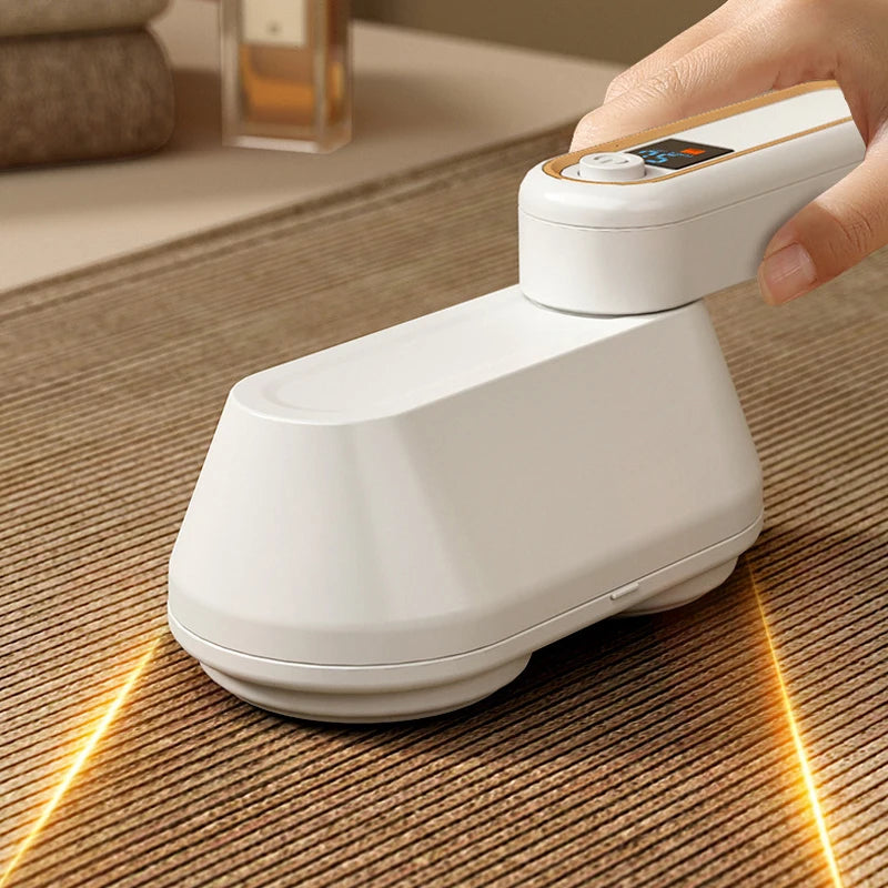 Rechargeable fabric shaver and lint remover in beige color, featuring a stainless steel mesh and ergonomic design for effective fuzz removal.