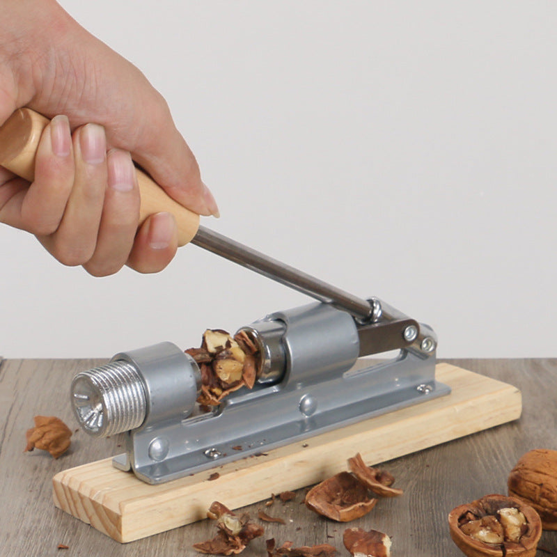 Mechanical Whole-grain Peeling Walnut Clip Nuclear Opener made of stainless steel and wood, designed for easy nut cracking.