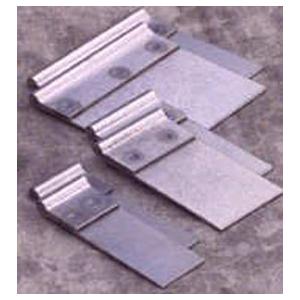 Metal shims on a surface.