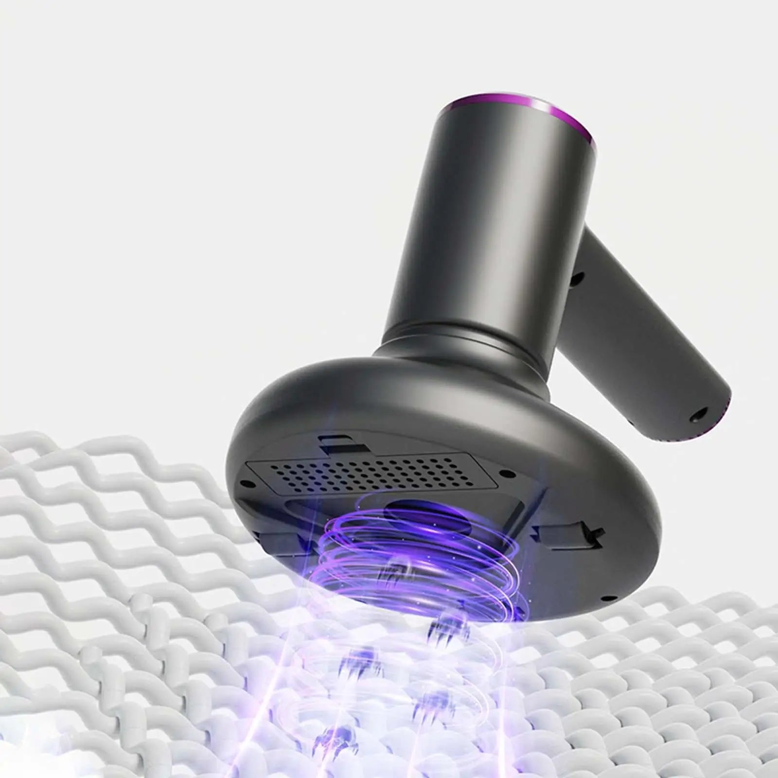 Handheld vacuum cleaner designed for effective cleaning of beds, carpets, and furniture, showcasing its sleek design and powerful suction capabilities.