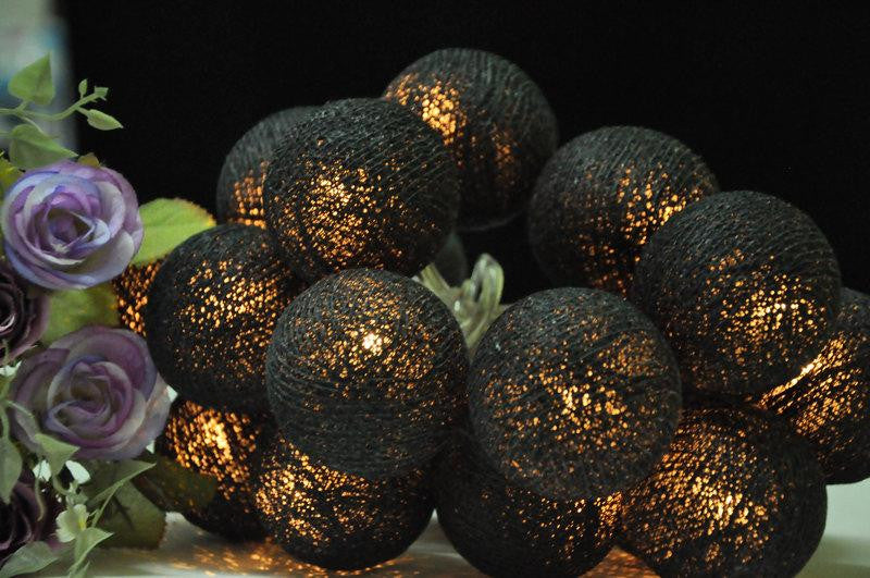 A set of 20 LED black cotton ball string lights, showcasing 5cm diameter balls on a 3-meter wire, perfect for indoor and outdoor decoration.