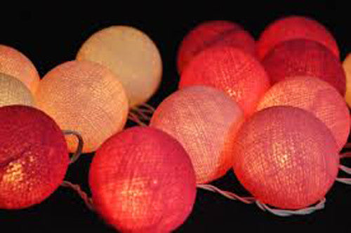 A set of 20 pink cotton ball string lights, battery powered, perfect for decoration.